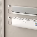 Two White Wall Mounted Air Conditioner Fans Installed On Wall With Window Blinds