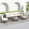 Outdoor Leisure Wicker Sofa Set With Light Cushions Coffee Table And Green Plants