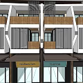 Multi Story Residential Building With Ground Floor Storefronts And Traditional Roof Design
