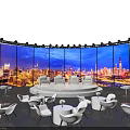 Modern Event Space With Round Stage Large Screen City Night View And White Seating