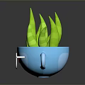 Green Leafy Plant In Blue Cup Shaped Pot With Glasses And Smiley Decoration