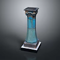 Ornate Architectural Blue Pillar with Intricate Carvings and Square Base Design