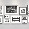Black and White Photo Wall with Various Sizes Frames and Street Scenes