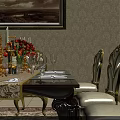 Elegant Dining Table Set With Golden Chairs Patterned Tablecloth Candelabra Red Flowers And Wine Glasses