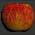 Fresh Vibrant Red Apple With Yellow Speckles On Dark Background