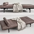 Stylish Modern Brown Leather Ottoman With Rolled Cushion Blanket And Metal Legs