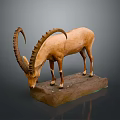 Brown Antelope Taxidermy Specimen With Large Curved Horns Standing On Gray Base