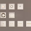 White Switch Panels With Various Sockets And Switch Combinations On Wall