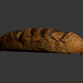 Crusty Golden Brown Artisan Bread With Diagonal Slits And Sesame Seeds Topping