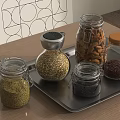 Clear Glass Spice Jars with Various Ingredients on Metal Tray Wooden Kitchen Tabletop