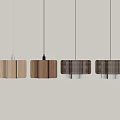 Modern Wooden Pendant Lights With Striped Design Hanging In Row On Light Wall