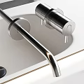 Sleek Modern Bathroom Washbasin Design With Countertop Faucet And Cabinet Lighting