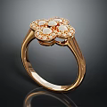Elegant Gold Clover Design Ring With White And Orange Inlaid Stones