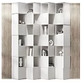 Modern White Bookcase with Geometric Compartments Holding Books Decorative Items and Lamp