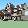 Two Story House Exterior With Brick Walls Large Windows Gabled Roof And Lawn Area