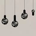 Modern Spherical Pendant Lights With Metallic Texture Hanging On White Wall