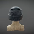 Black Safety Helmet With Red Cross Emblem On Wooden Mannequin Head