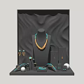 Luxury Jewelry Accessories Display With Gold Necklace Turquoise Earrings Bracelets And Rings On Black Stand