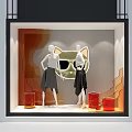 Fashion Window Display With Mannequins In Black Skirts And Cat Shaped Decor