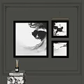 Black And White Abstract Paintings Large And Small Framed Hanging On Dark Green Wall