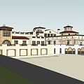 Traditional European Hotel Building With Red Roof White Walls Arched Windows And Courtyard