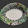 Decorative Porcelain Basket With Green Handles Openwork Pattern And Floral Accents