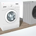 White Front Load Washing Machine And Dryer In Home Laundry Space