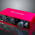 Red Focusrite Audio Interface with Control Knobs and Input Output Ports