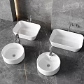Three White Modern Bathroom Sinks With Square And Round Shapes On Marble Countertop