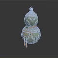 Decorative Gourd Shaped Household Item With Silver Ornaments Green Accents Orange Rope And Tassels