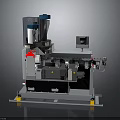 Industrial Processing Equipment With Blue Components Gray Main Body Yellow Support Feet And Conveyor Belt