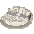 Round Bed Interior Design With Multiple Pillows And White Bed Sheets