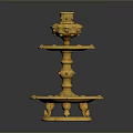 Golden Two Tiered Candle Holder With Decorative Base And Carved Details