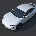 White Porsche Electric Sports Car With Sleek Exterior Design And Modern Look