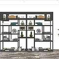Stylish Black Frame Shelving Unit with Decorative Items Potted Plants Dishes Books and Baskets