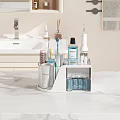 Bathroom Vanity Sink With Marble Countertop And Organizer Holding Toothbrushes Electric Toothbrush And Skincare Bottles