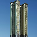 Modern High Rise Residential Building With Light Exterior And Multiple Windows