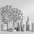 Stylish Bathroom Accessories Collection With Soap Bottles Plant Candle And Coral Decor