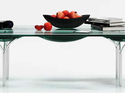Modern Glass Coffee Table With Metal Legs Black Bowl Red Fruits Camera And Stacked Books 3d model