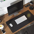 Modern Wooden Office Desk With Computer Monitor Keyboard Mouse Desk Lamp And Natural Light