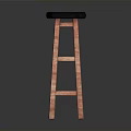 Tall Wooden Stool With Round Black Seat Cushion And Simple Design For Kitchen Use