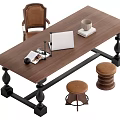 Wooden Desk with Ornate Black Legs Laptop Coffee Mug Magazine Chair and Round Stools