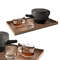 Modern Tea Set with Black Teapot and Glass Cups on Wooden Tray