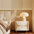 Modern Bedside Table with Curved Drawers Gold Legs and Mushroom Lamp in Cozy Bedroom