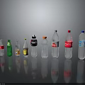 Various Branded Beverage Bottles With Colorful Green Red Transparent On Grey Background And Reflections