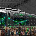Vibrant Stage With PULSE LED Screens Green Lights And Audience Glow Sticks