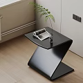 Modern Black Z Shaped Coffee Table with Magazine Transparent Vase and Green Plant