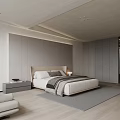 Modern Bedroom Interior With Paneled Wall Upholstered Headboard Table Lamp Accent Chair And Decorative Artwork