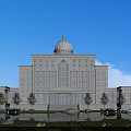 White European-style Building With Dome Windows Water Pool Trees And Blue Sky