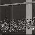Modern Silver Decorative Chandelier With Bright LED Lights Hanging In Interior Space